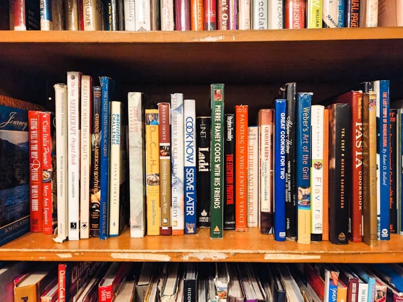 A book shelf filled with lots of books