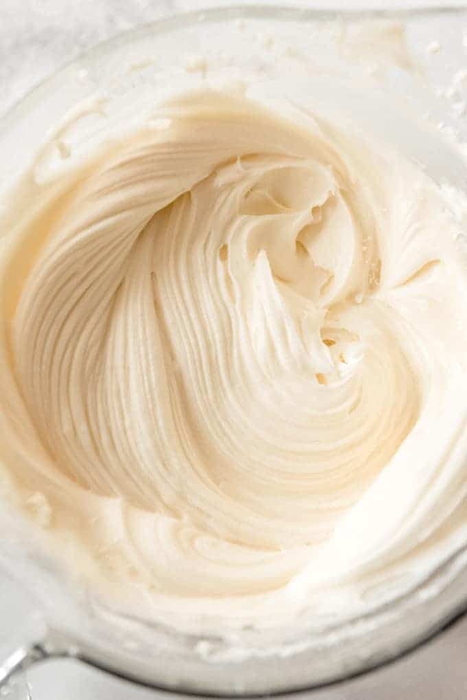 An Image of cream cheese frosting in a mixer bowl.