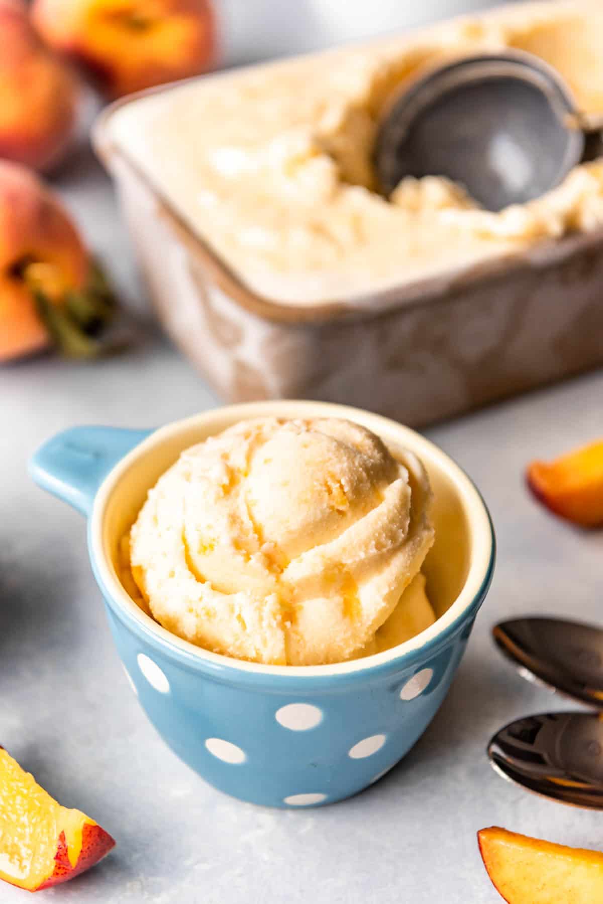 An image of a bowl of homemade peach ice cream.