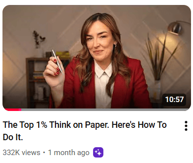 woman holding pen in hand