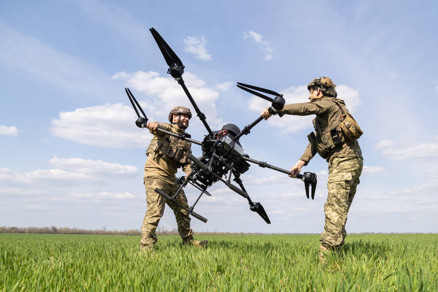 Soliders calibrate a drone