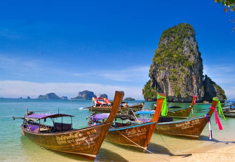 Boats moored at the beach in Thailand