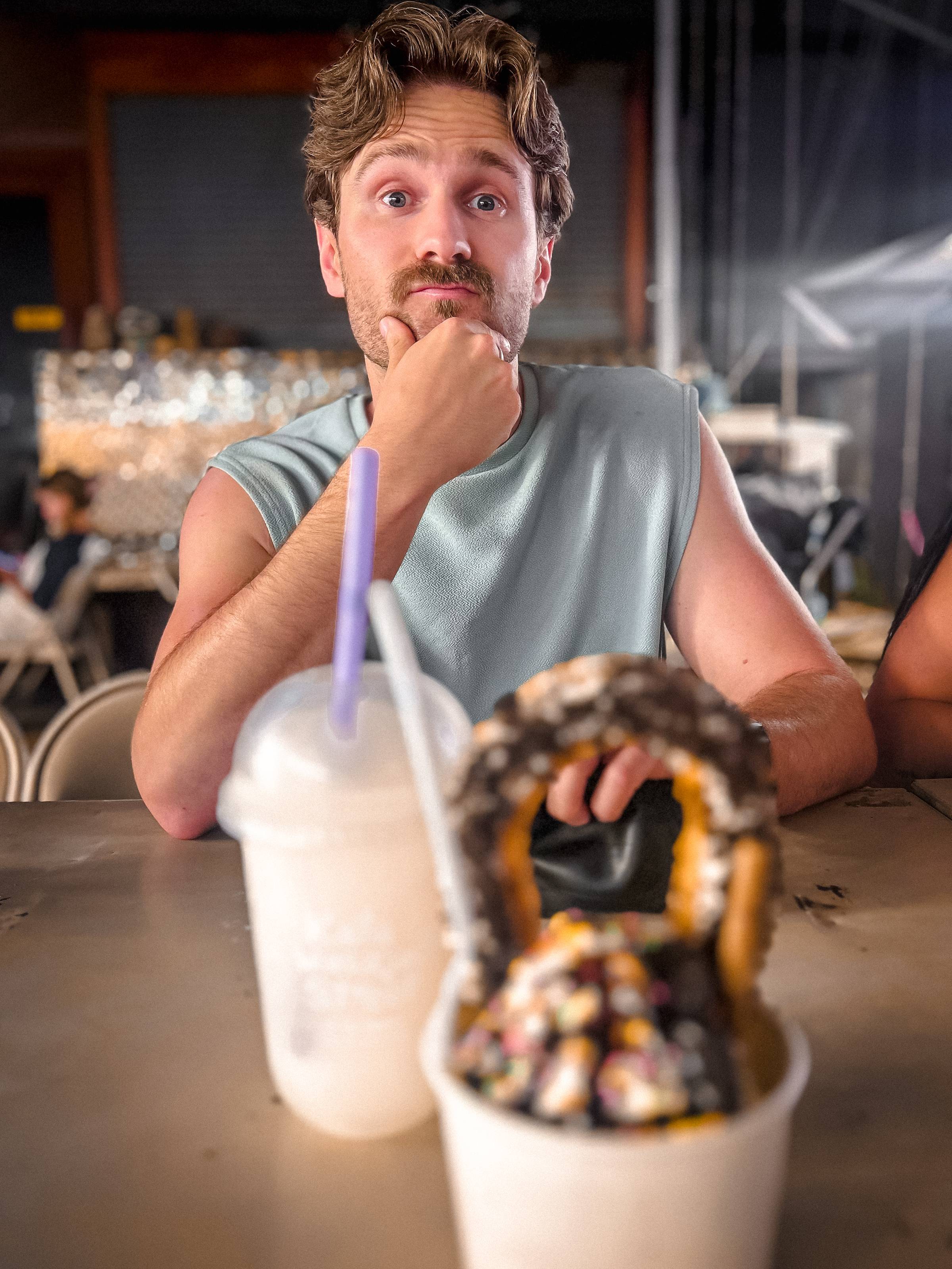 A man and his desserts at the night market in Phuket