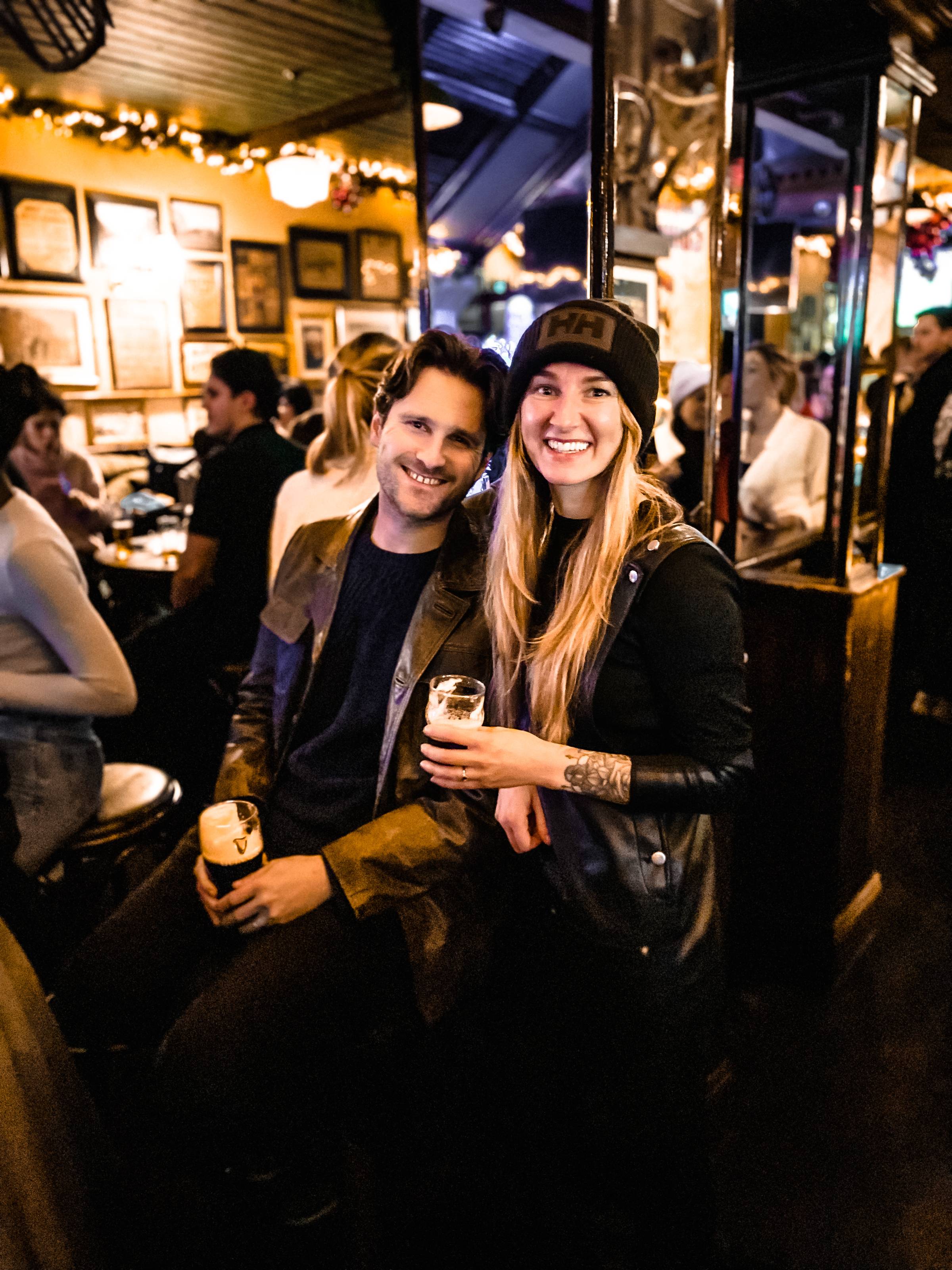 Man and woman Enjoying a Guinness in Dublin, Temple Bar