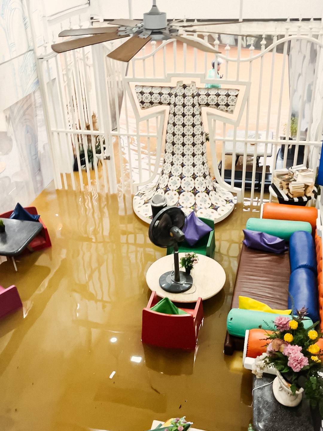 a hotel lobby filled with water after a landslide in Phuket.