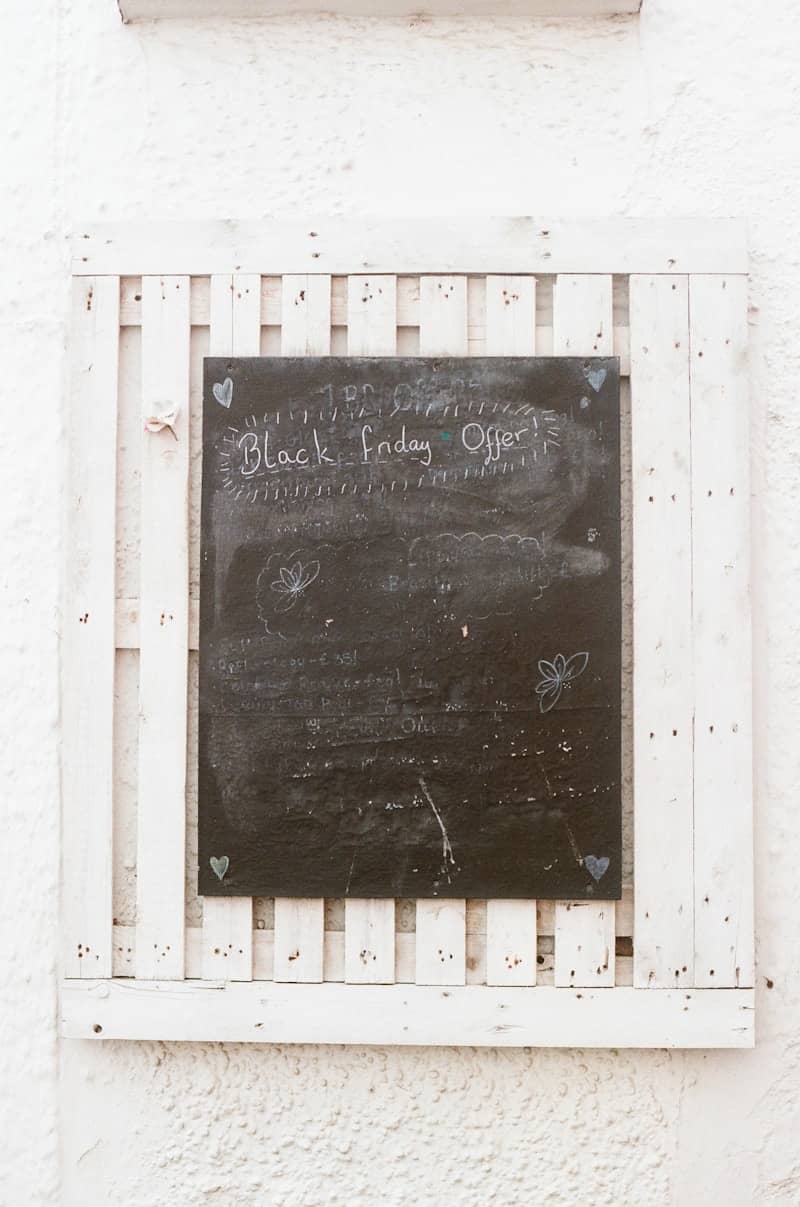 Chalkboard with "black friday offer" written on it.