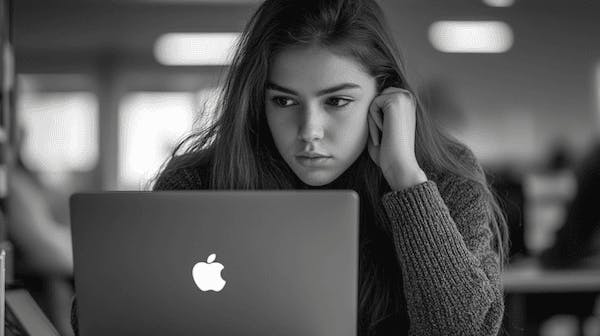 Student on an Apple macBook laptop