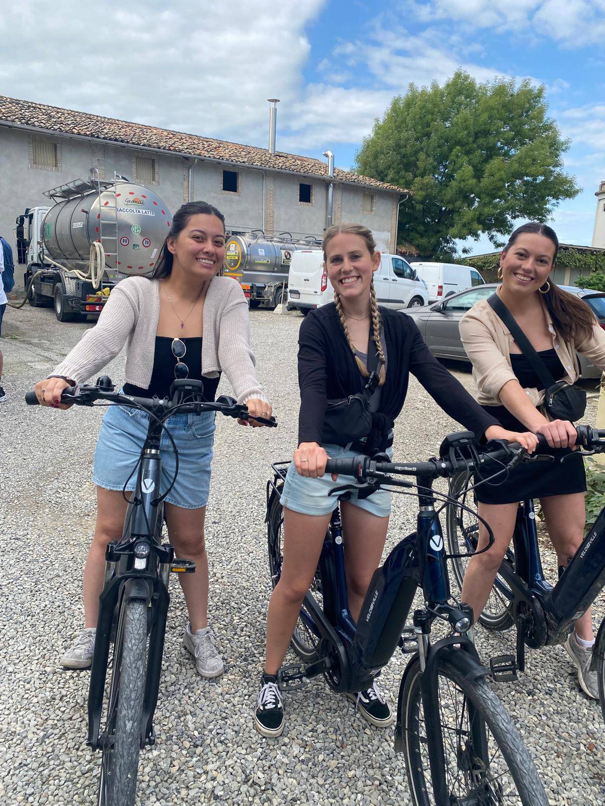three girls on bikes.