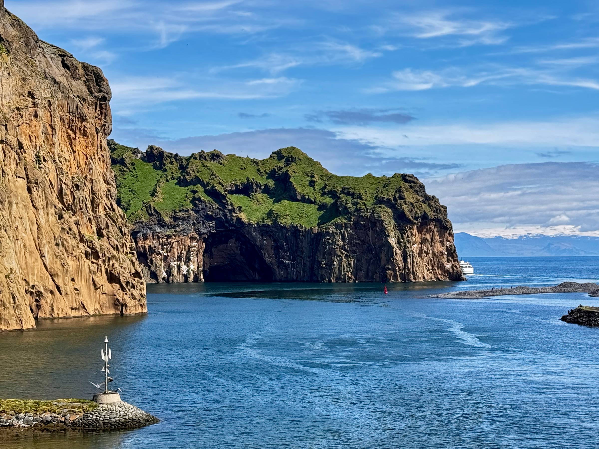 blue ocean and volcanic cliffs in Iceland