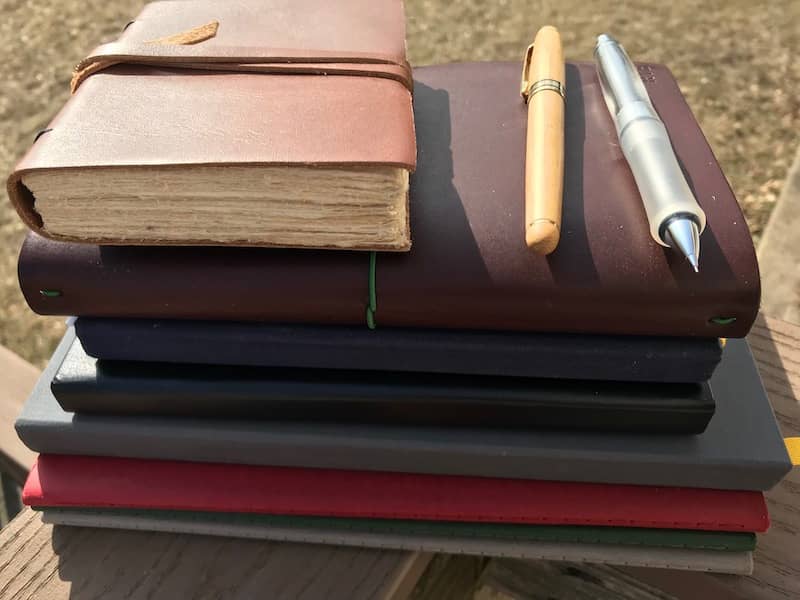 A stack of loyal notebooks.