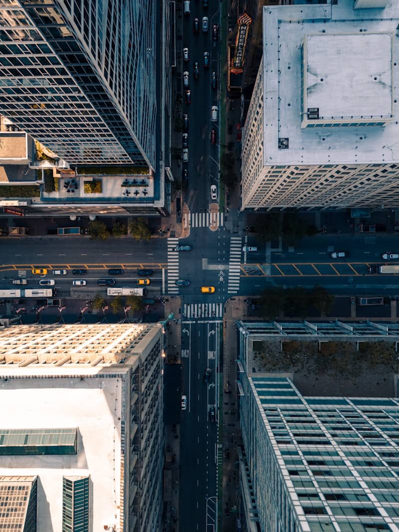 An aerial view of a city with tall buildings