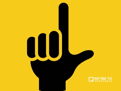 yellow background with black hand in the shape of an L
