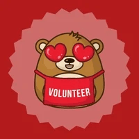 A cartoon teddy bear with heart eyes wearing an apron that says "Volunteer"