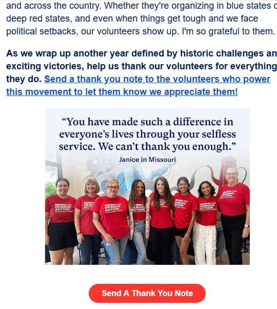 Volunteers in red t-shirts smile at the camera under a thank-you message from another supporter