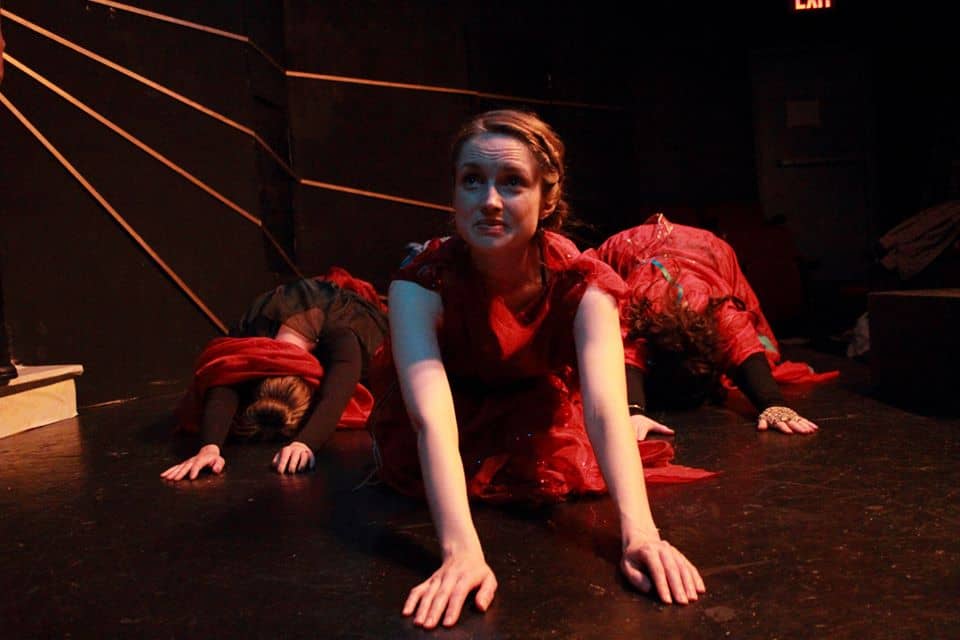 Lee prostrate onstage as the Chorus Leader in an Off-Off-Broadway production of Agamemnon