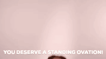 A woman gives a passionate slow clap with the words, "You deserve a standing ovation!"