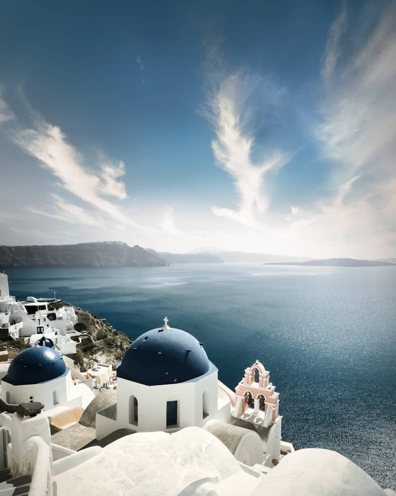 A beautiful view of the ocean and some buildings