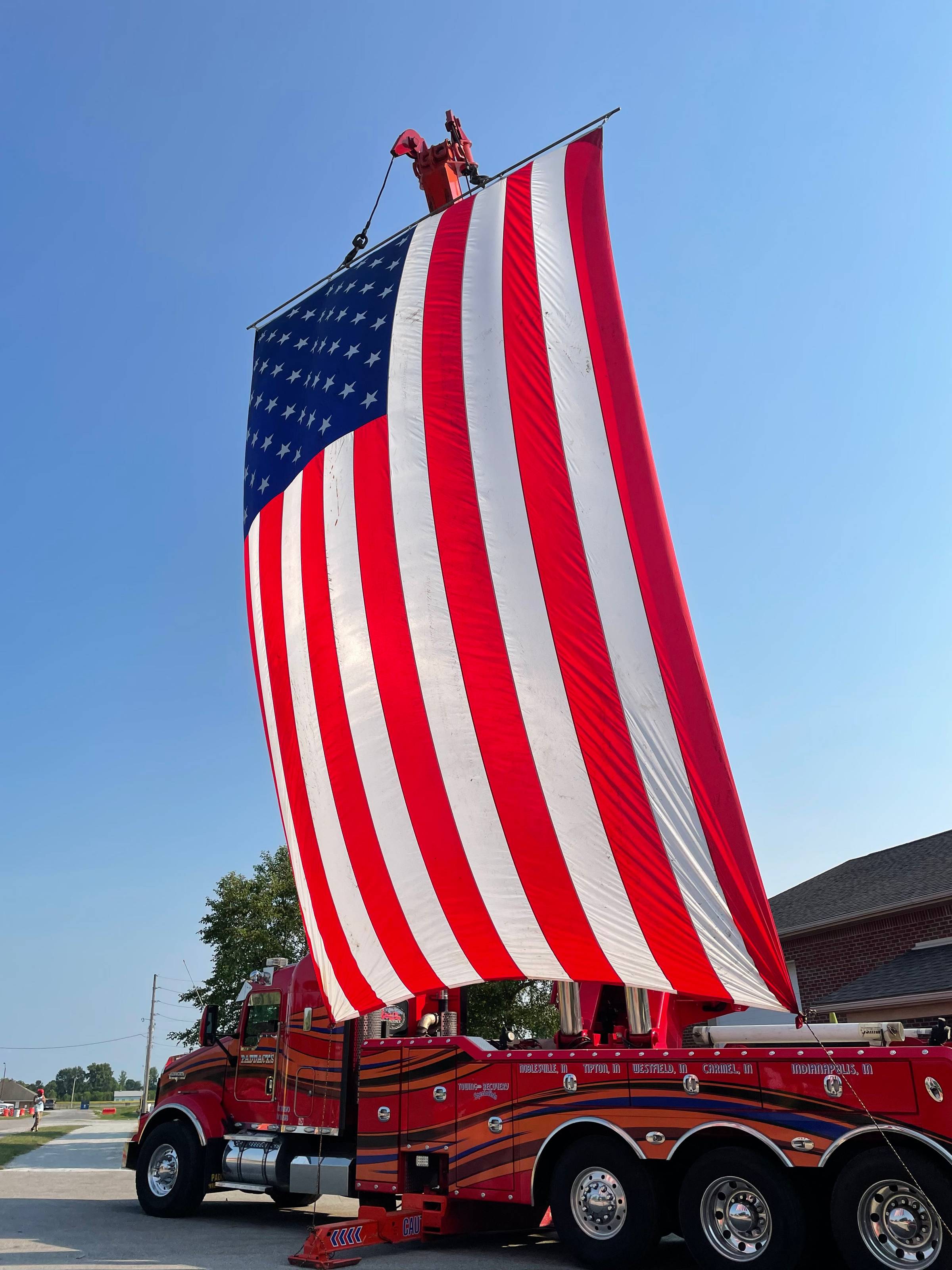 American flag hanging from a firetruck at the Fourth of July celebration in Cicero, IN