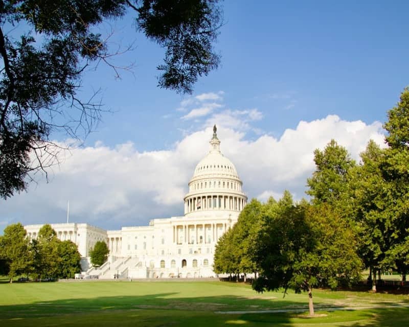 The united states capitol building on a sunny day.