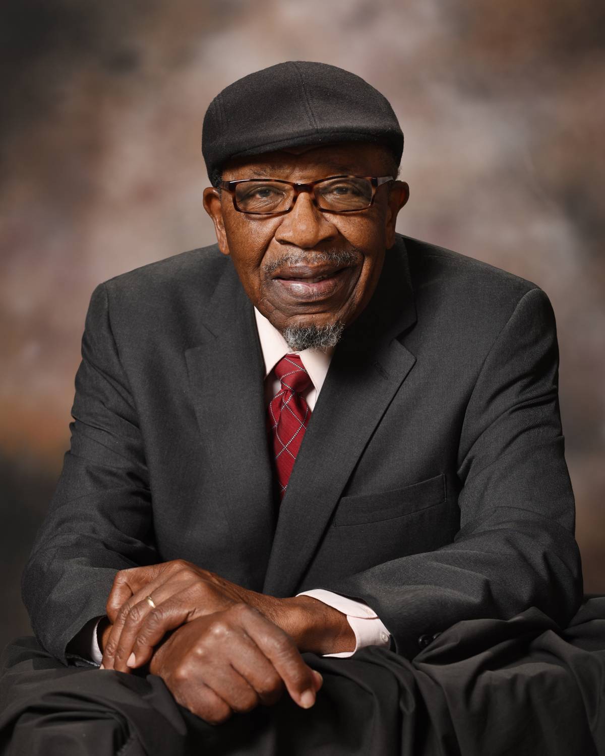 Dr John M Perkins