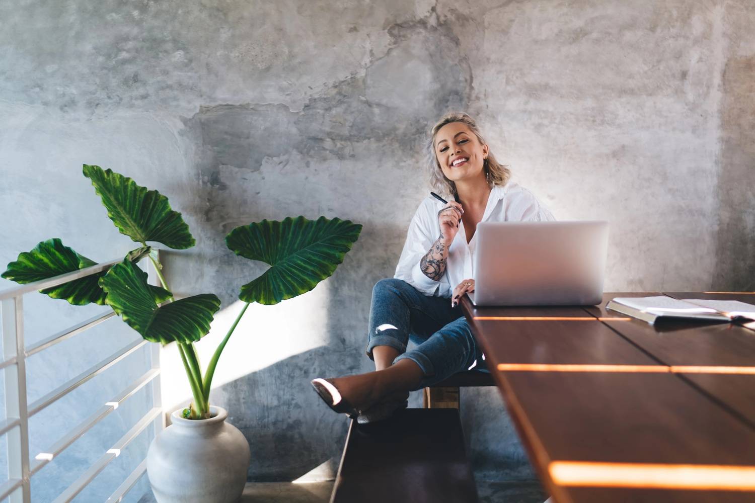woman sitting in front of laptop