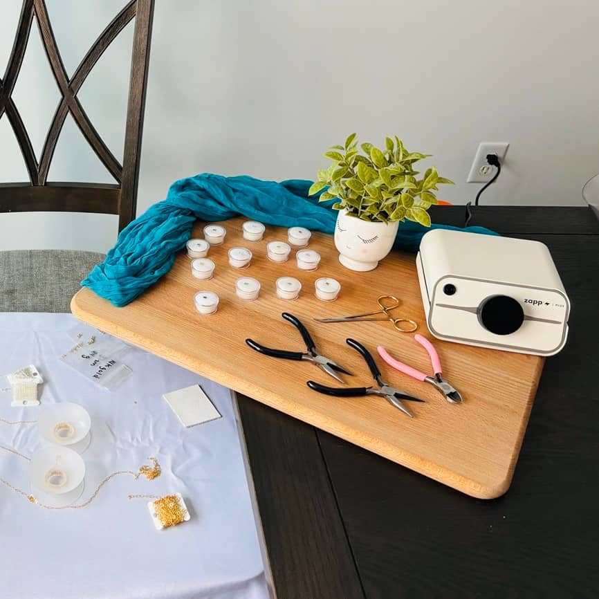 permanent jewelry tools on a table
