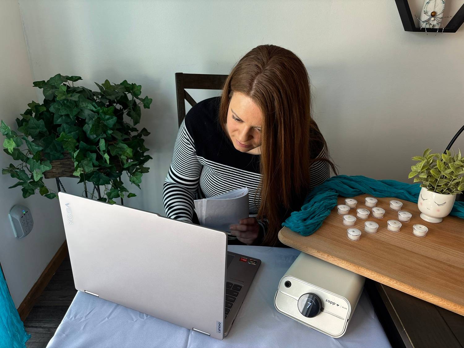 Trinity working on a laptop