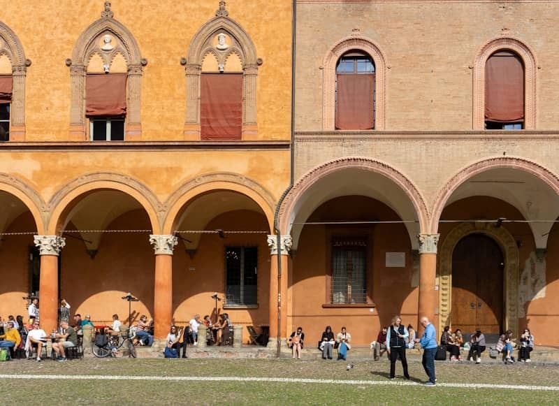 A group of people standing in front of a building