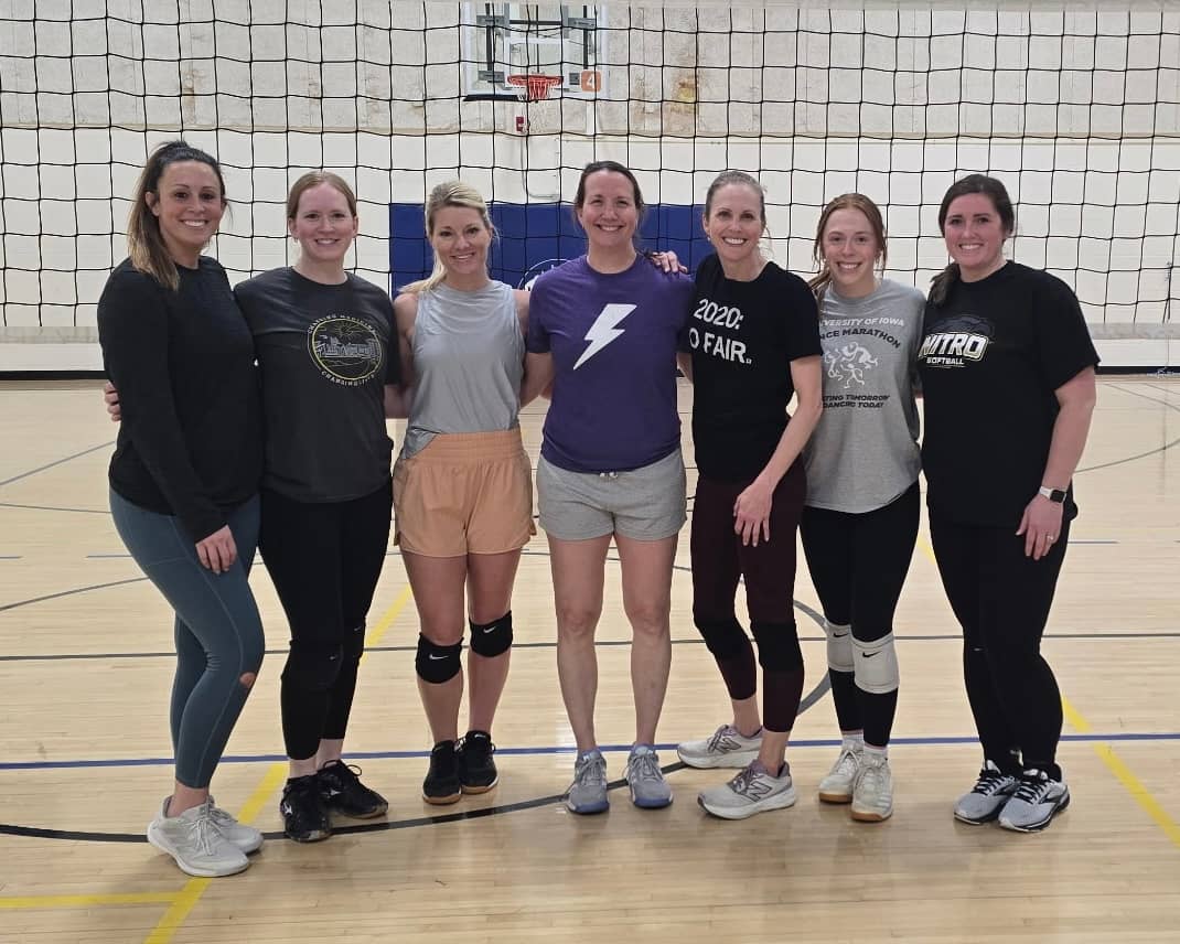 Seven 40-something ladies after a volleyball championship match.
