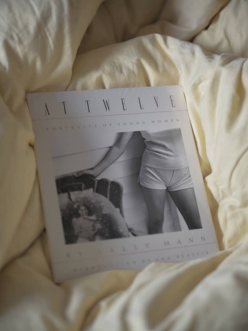 Book cover titled at twelve in soft bedding