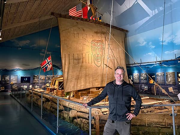 Scott stands before the Kon-Tiki raft in Oslo, Norway. 