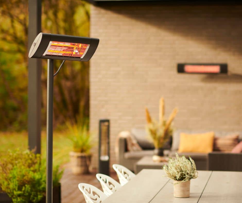 Outdoor heaters over a patio dining area.