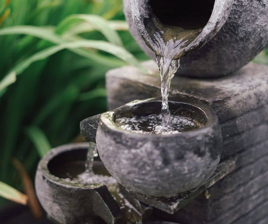 Small triple level grey water fountain.