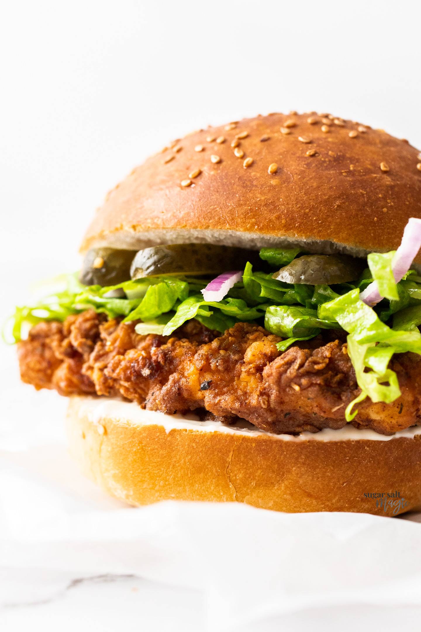 Closeup of a crispy chicken burger.
