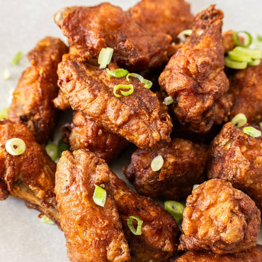 A pile of fried chinese chicken wings.
