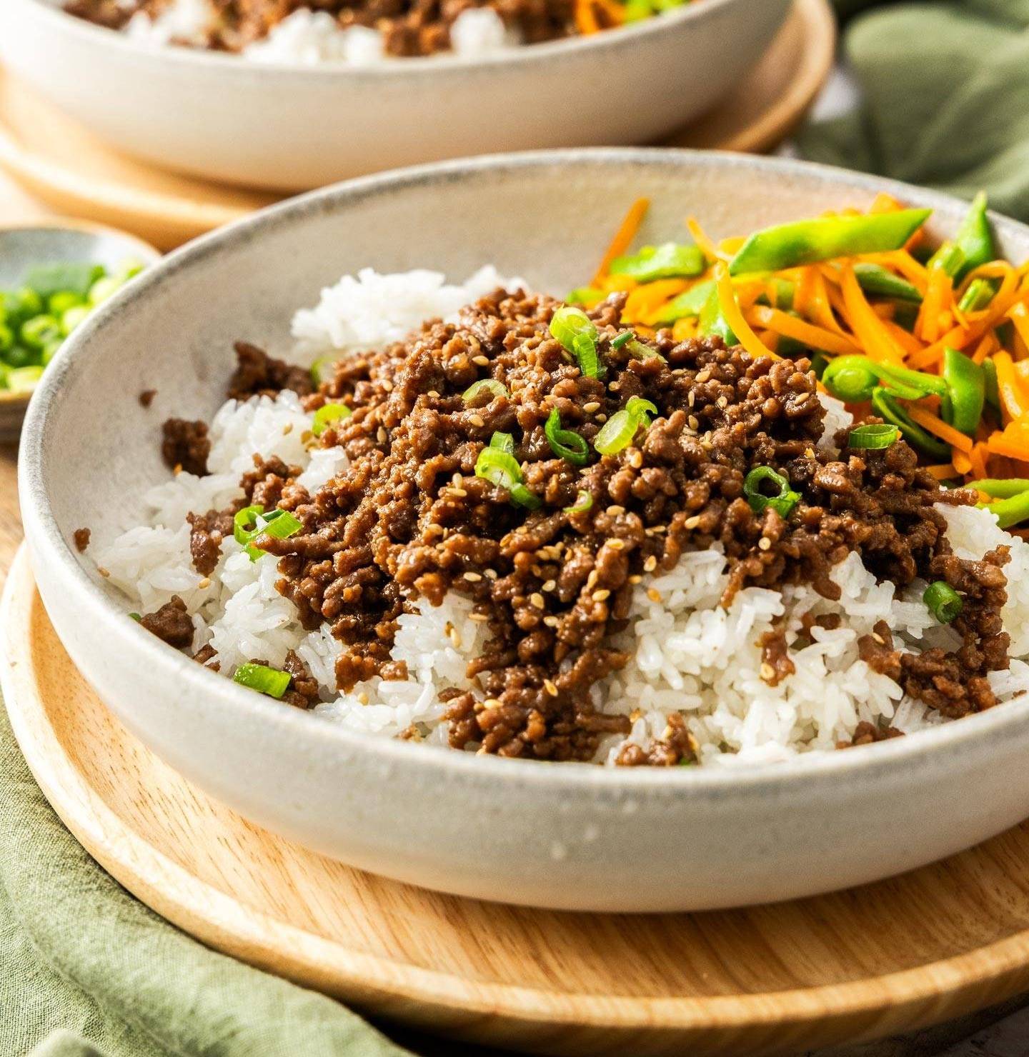 A bowl of rice topped with teriyaki beef mince.