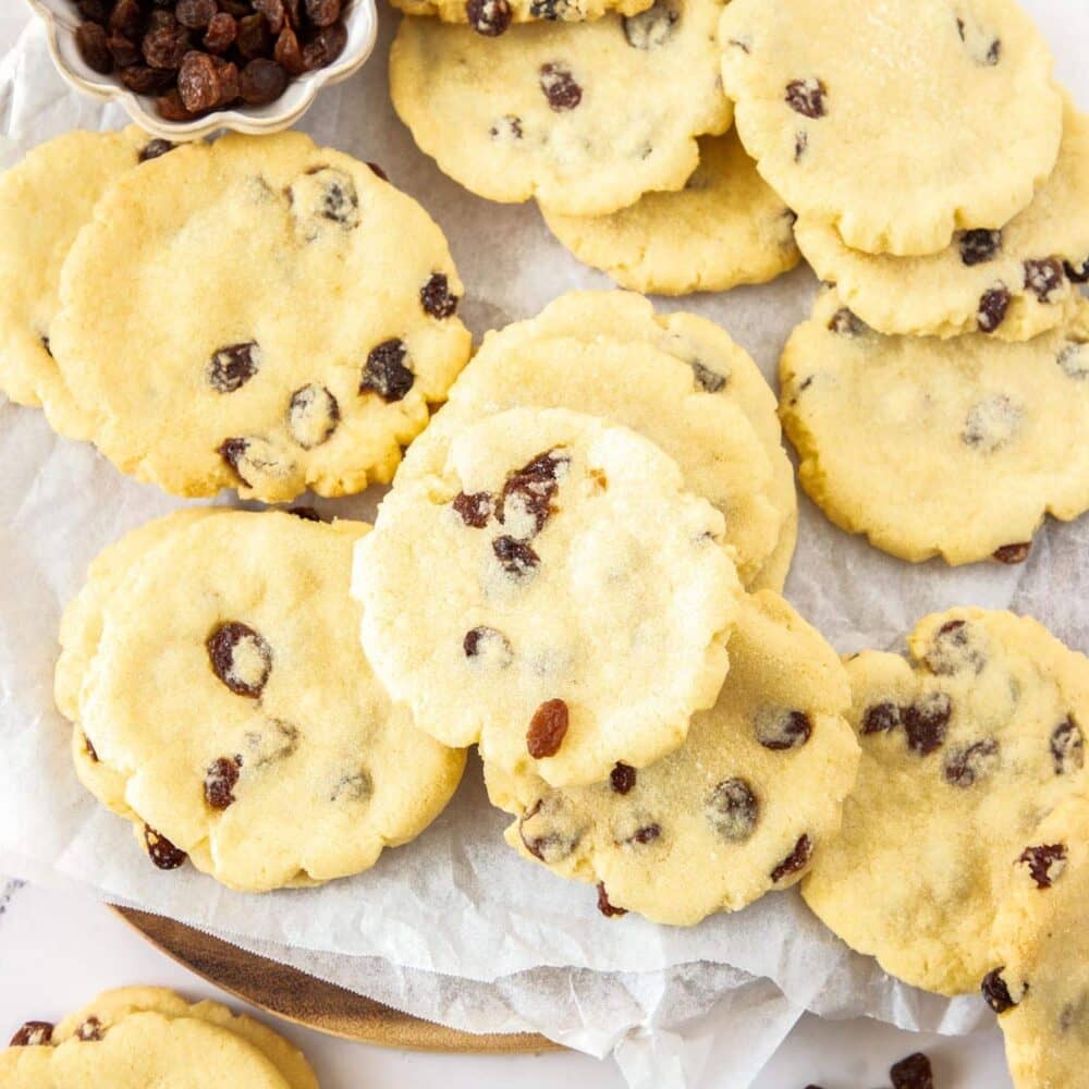 Top down view of a batch of sultana cookies.