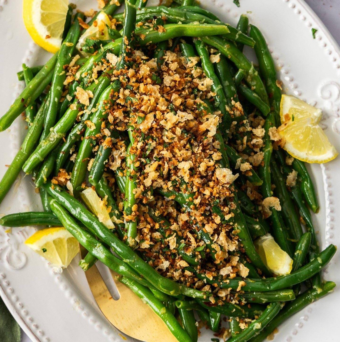 A batch of lemon green beans on a platter.