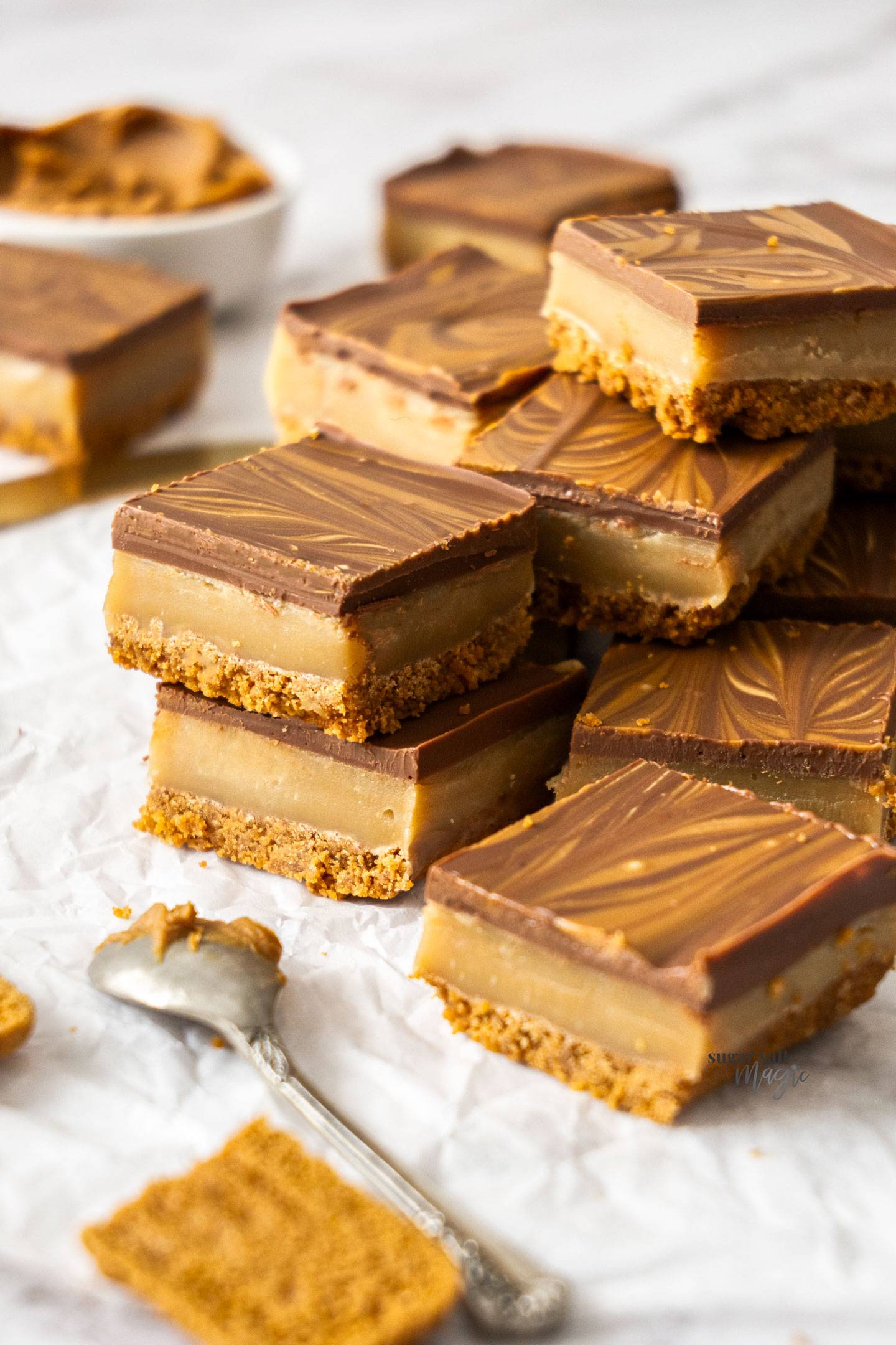 A stack of biscoff millionaires slice.