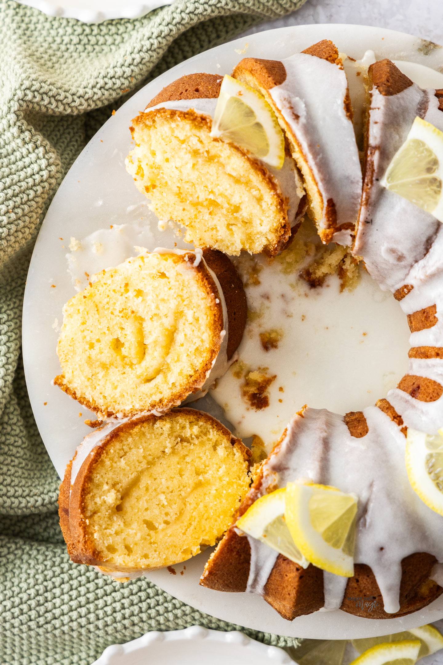 Top down view of the lemon butter cake cut into slices.