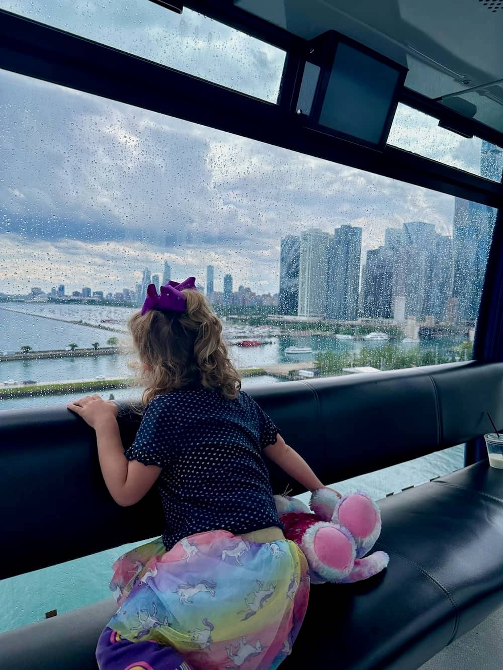 Hayley's daughter on the ferris wheel, overlooking Lake Michigan and the Chicago skyline