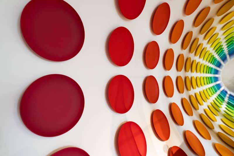 Abstract wall art with colorful circular gradient discs
