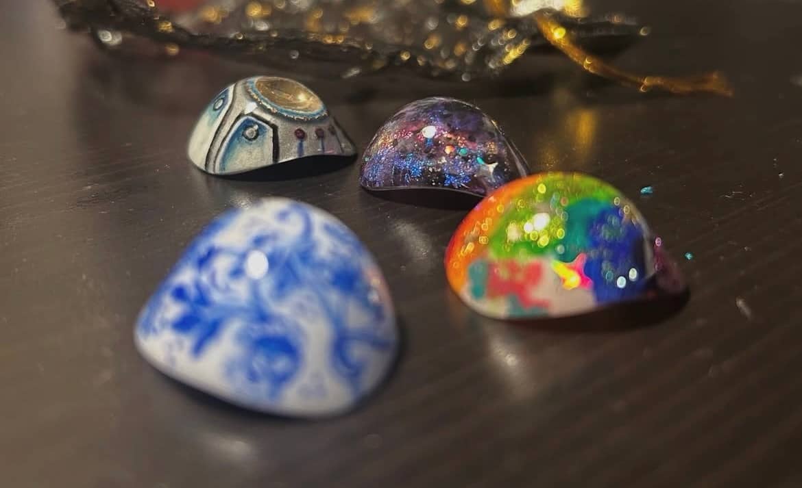 Four colorful prosthetic eyes