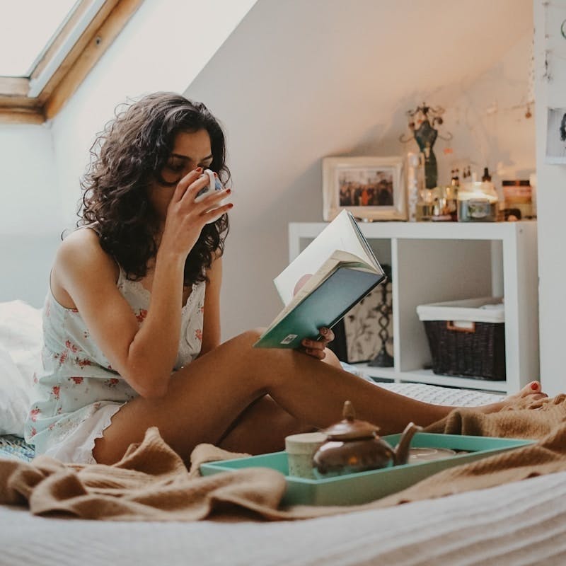 woman holding book