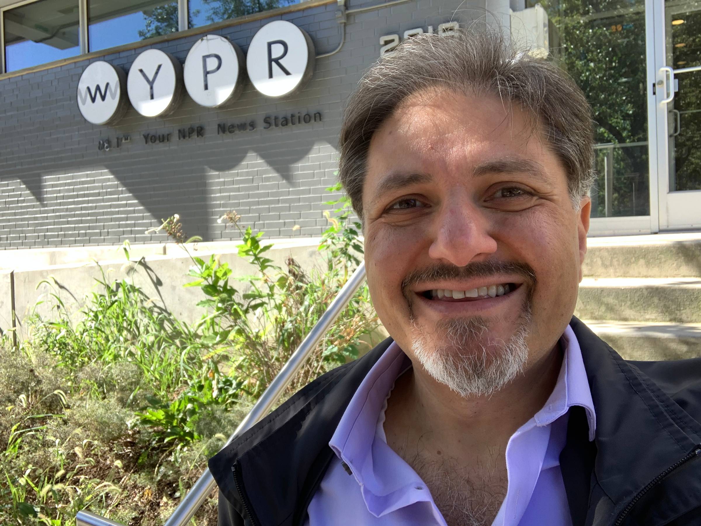 Ramsey Hanhan in front of the WYPR station in Baltimore