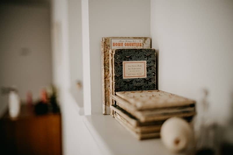 Stack of vintage books on a shelf