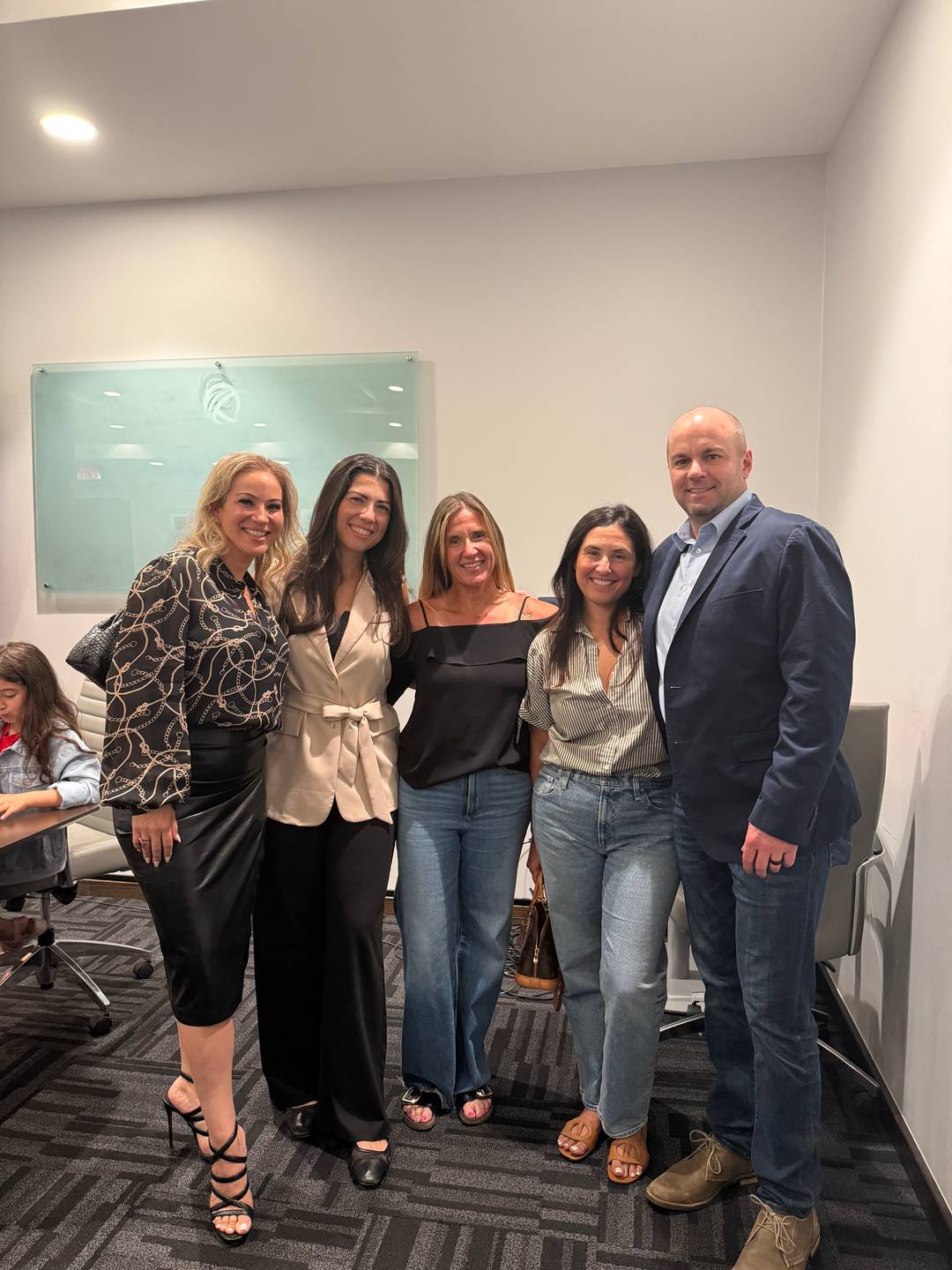 Nick Berry poses with Jessica Cohen, Lidice Porro, Romi Wallach, and the Daily Drip crew at the Centsible Solutions ribbon-cutting at the Boca Raton Chamber of Commerce.