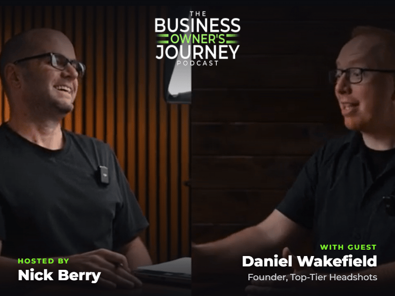 Nick Berry and Daniel Wakefield laughing mid-conversation during a recording of The Business Owner's Journey podcast, split-screen view with both seated at a table
