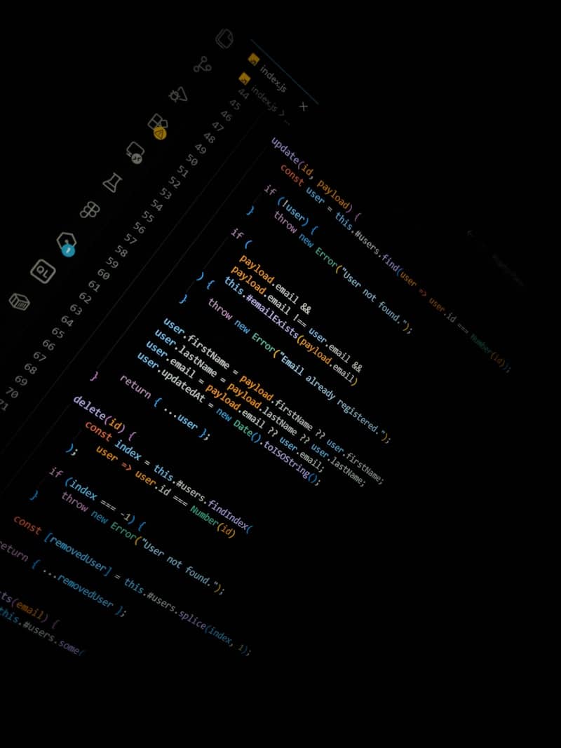 Computer code on a dark screen with development icons.