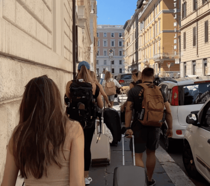 Tourist dragging their suitcases